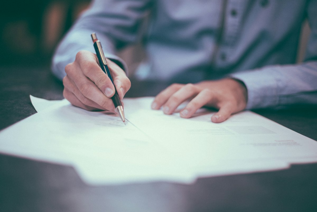 Signing the title to sell a car